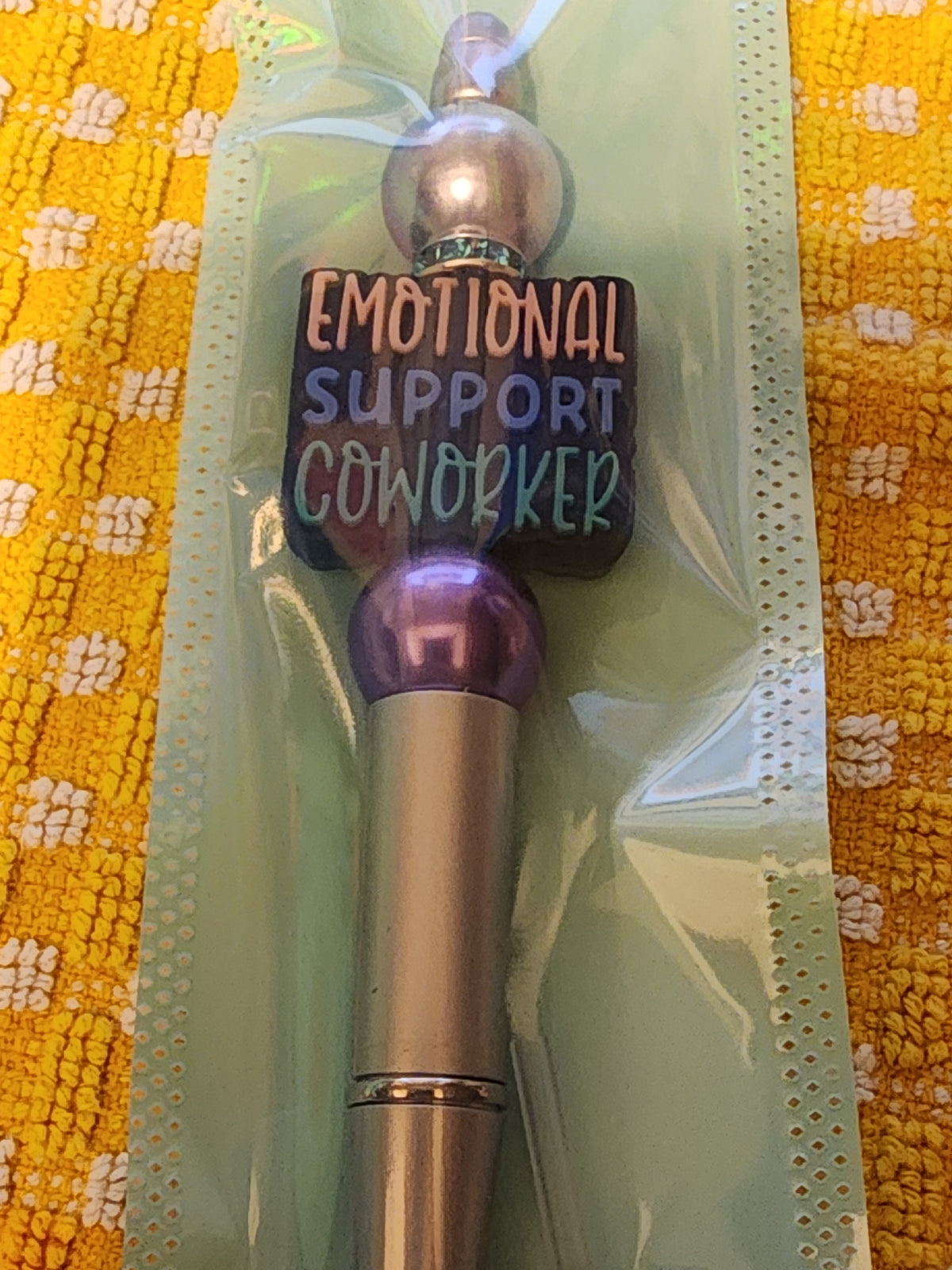 Silver and purple emotional support coworker pen