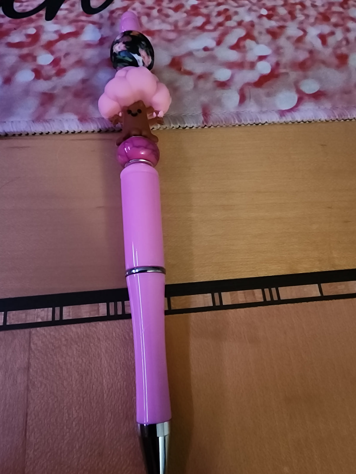 Happy pink tree with a floral bead