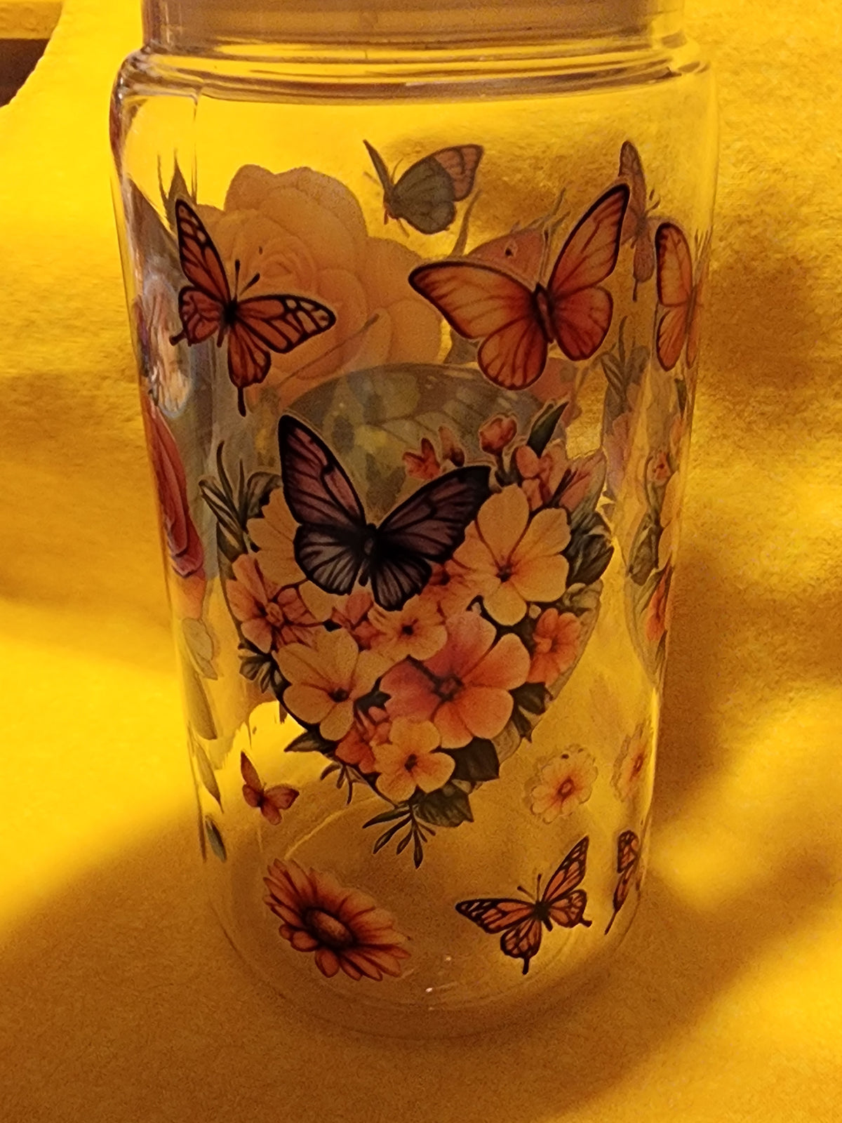 Flowers with colorful butterflies 16 ounce tumbler