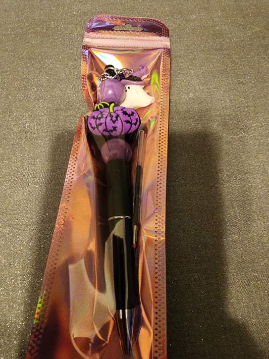 Purple pumpkin 🎃 with bats and a ghost charm pen
