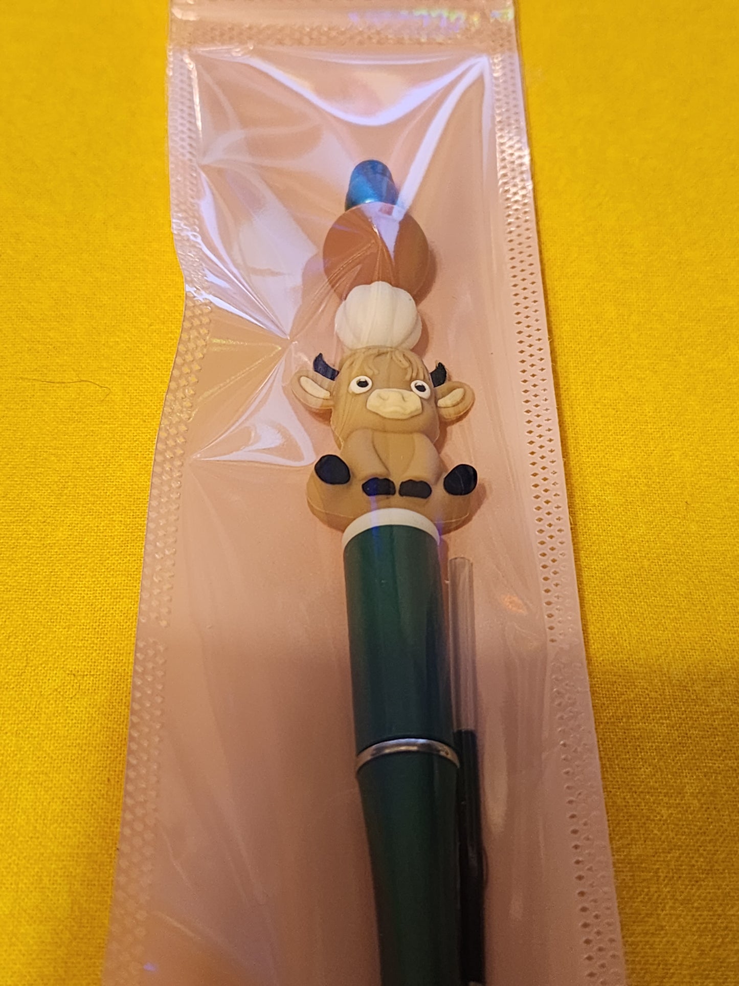 Tan Highland cow pen