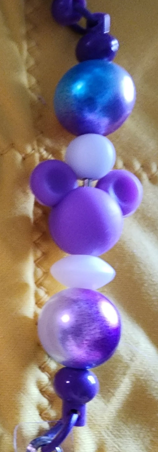 Purple MM head badge reel