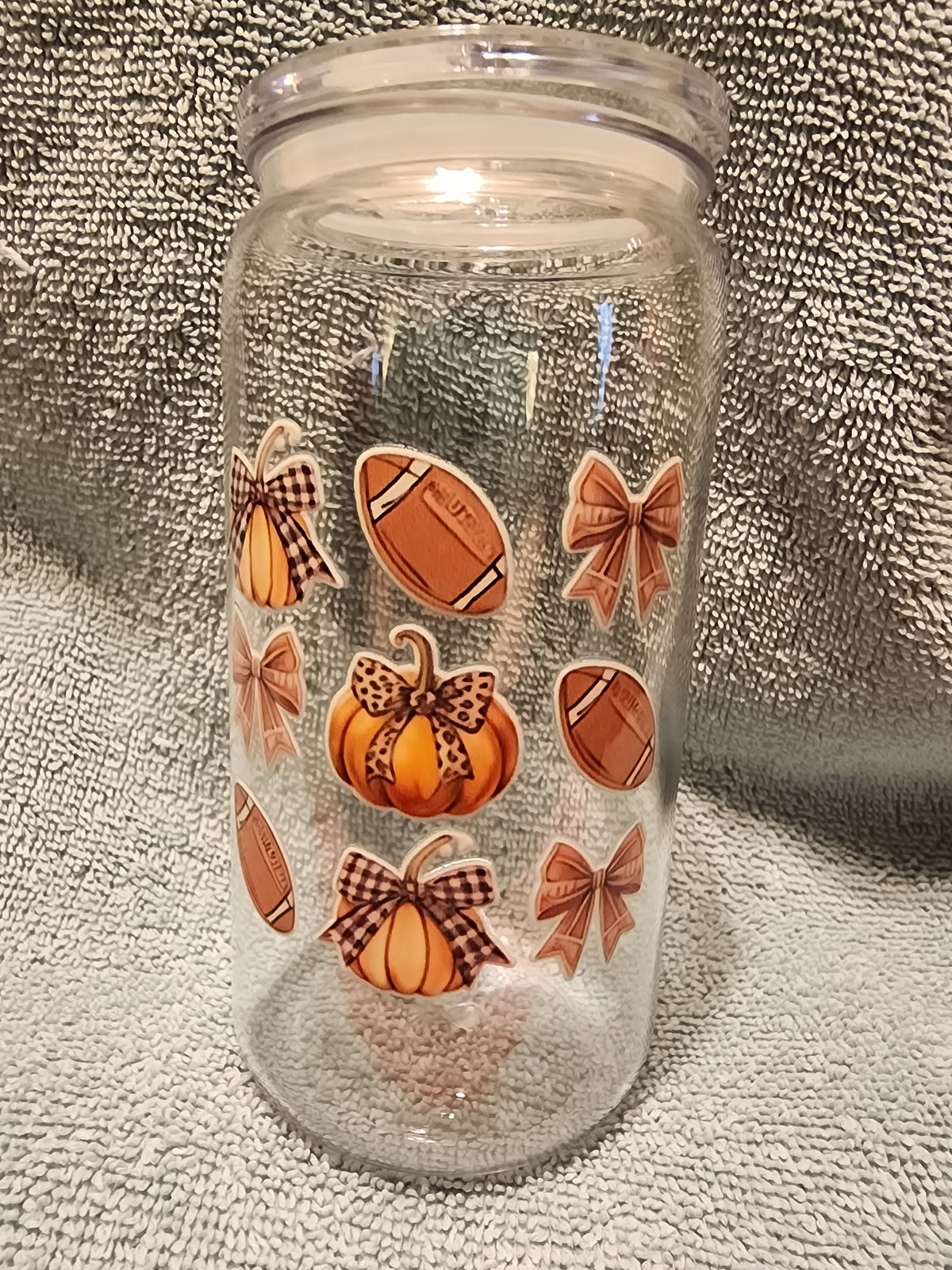 Pumpkin football and bows tumbler