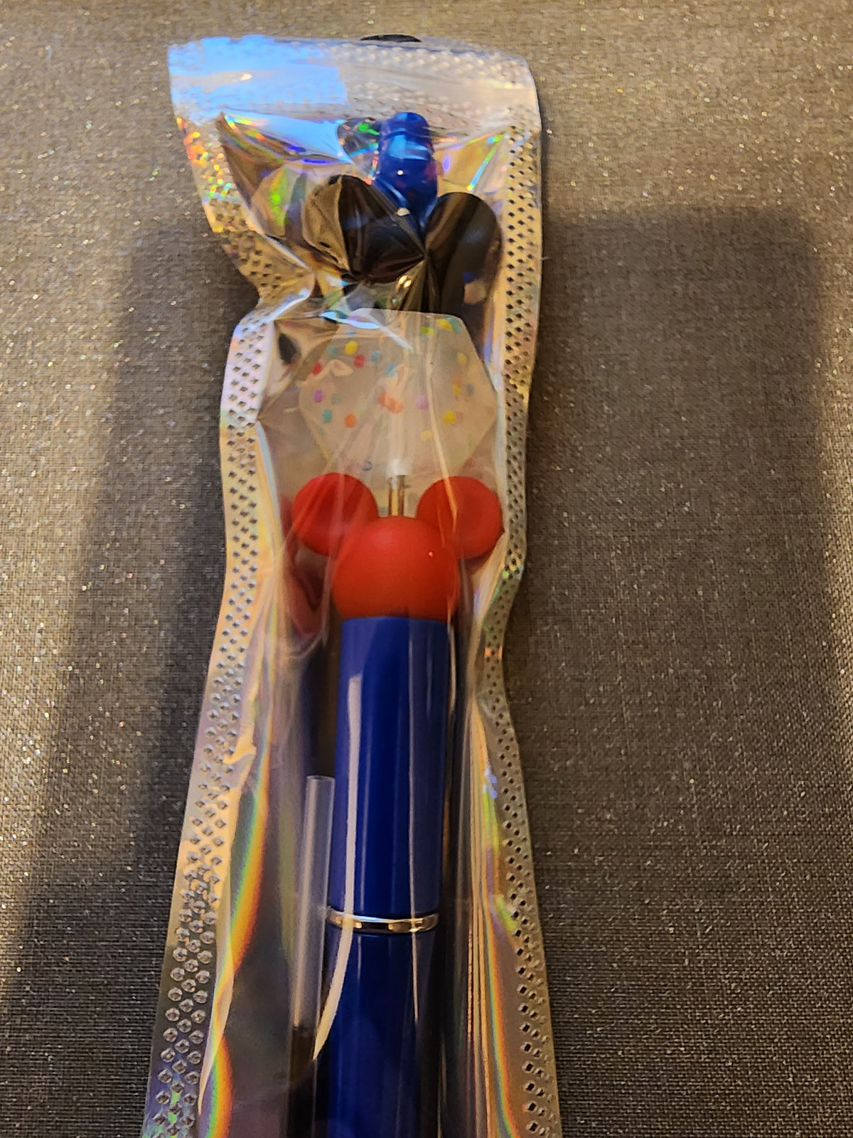 Red and black mouse head blue pen