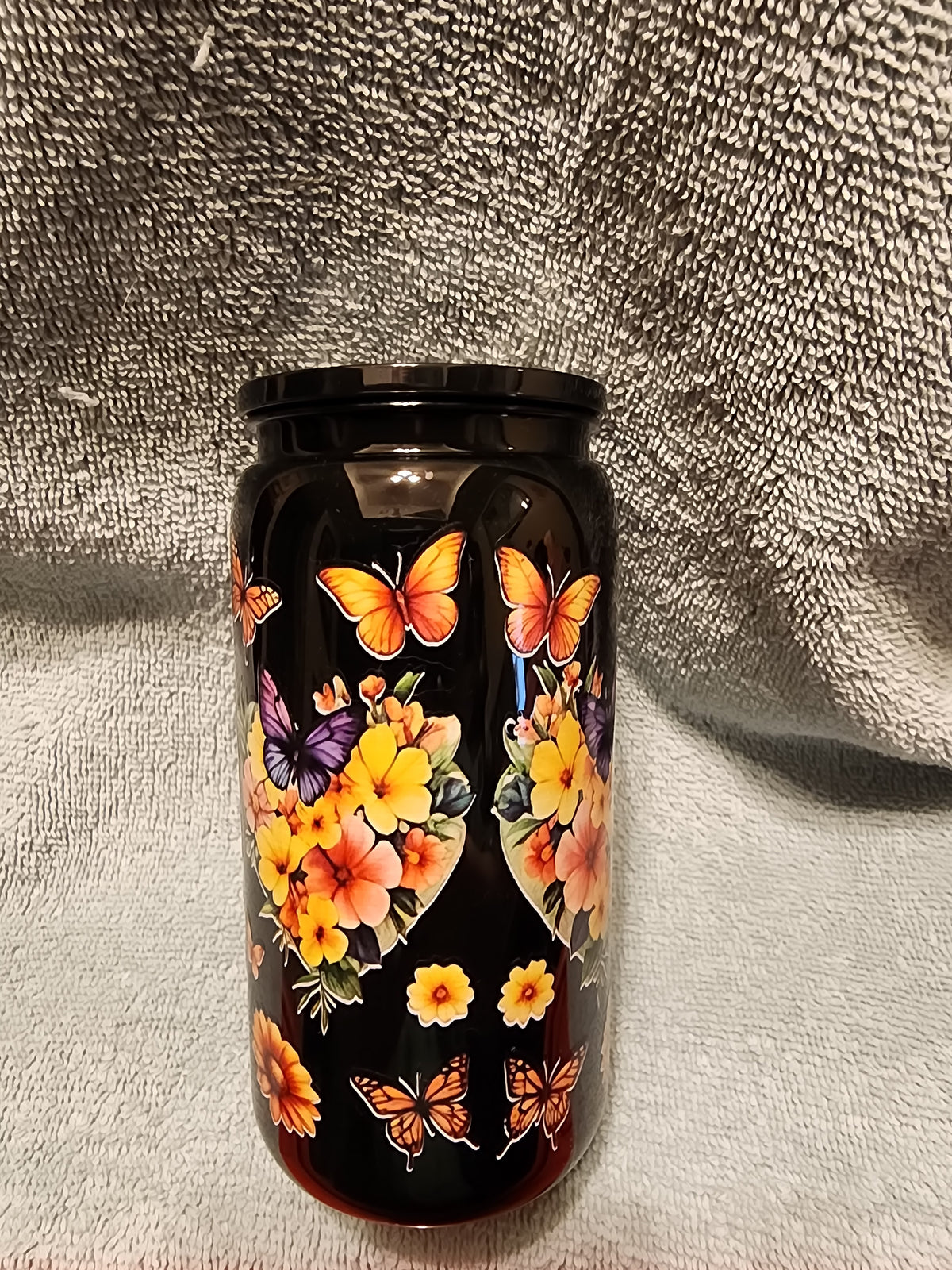 Butterflies 🦋 and flowers 🌼 tumbler