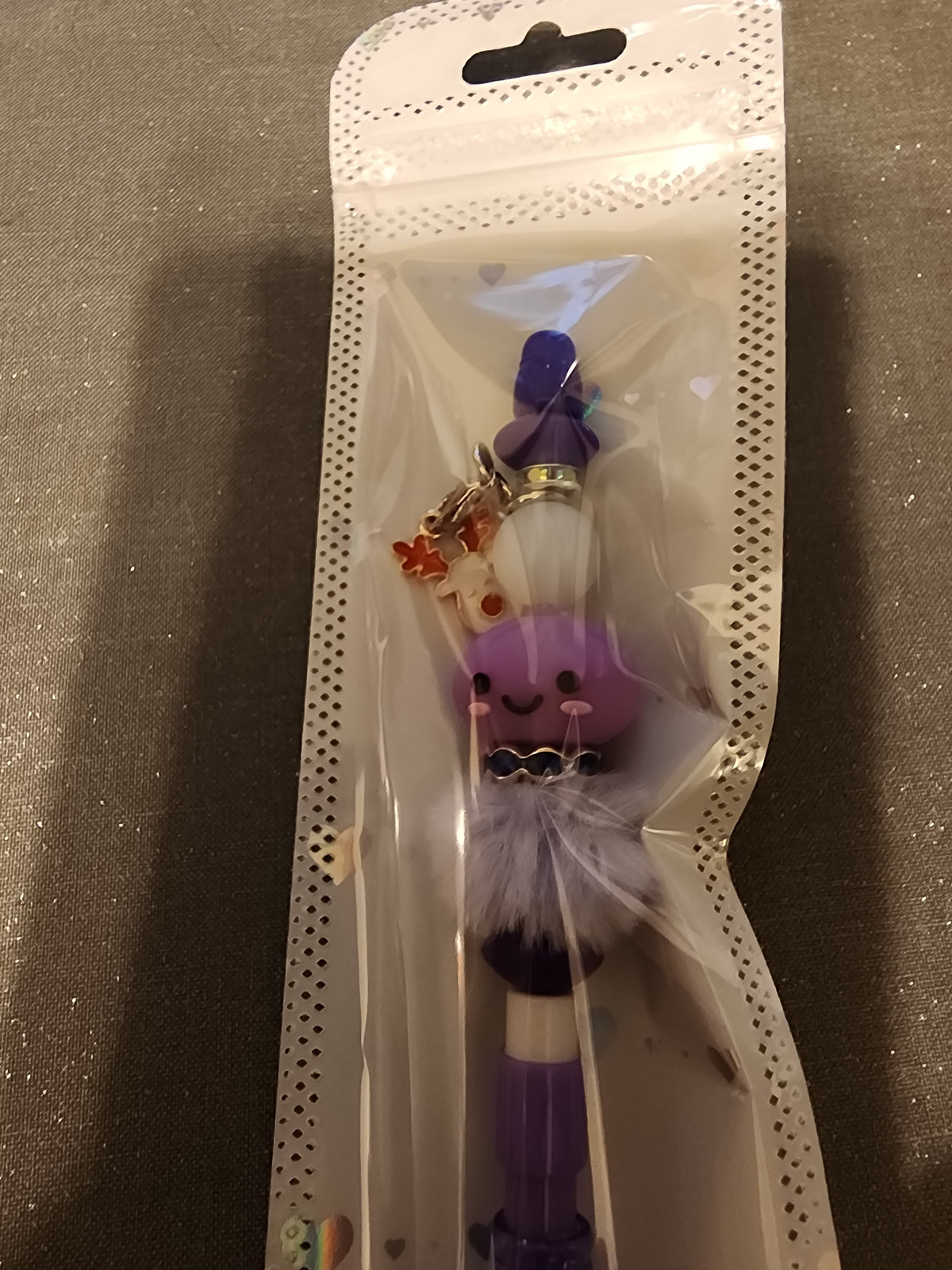 Purple dumpling with reindeer charm mechanical pencil