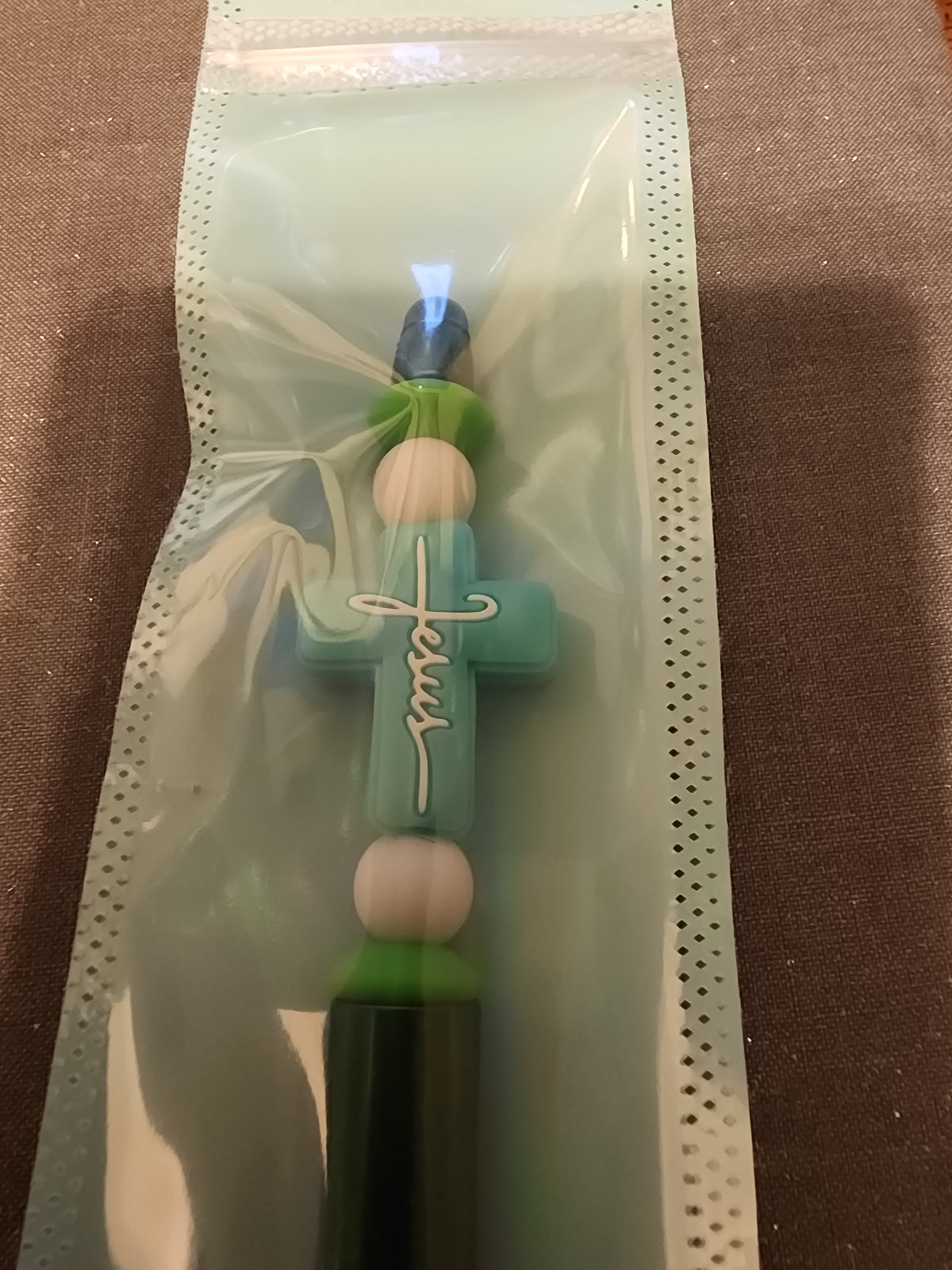 Green and teal Jesus pen
