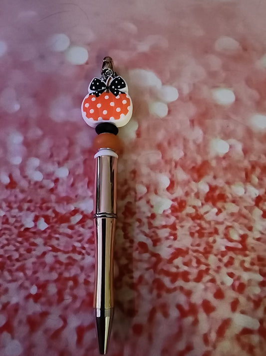 Poke a dot pumpkin pen with a gold base
