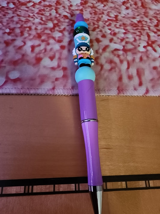 Nutcracker on purple pen