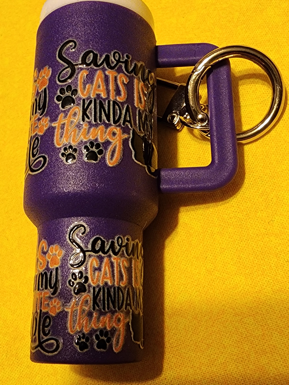 Saving cats chapstick holder