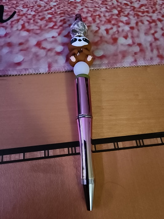 Sloth pen with a glow in the dark bead