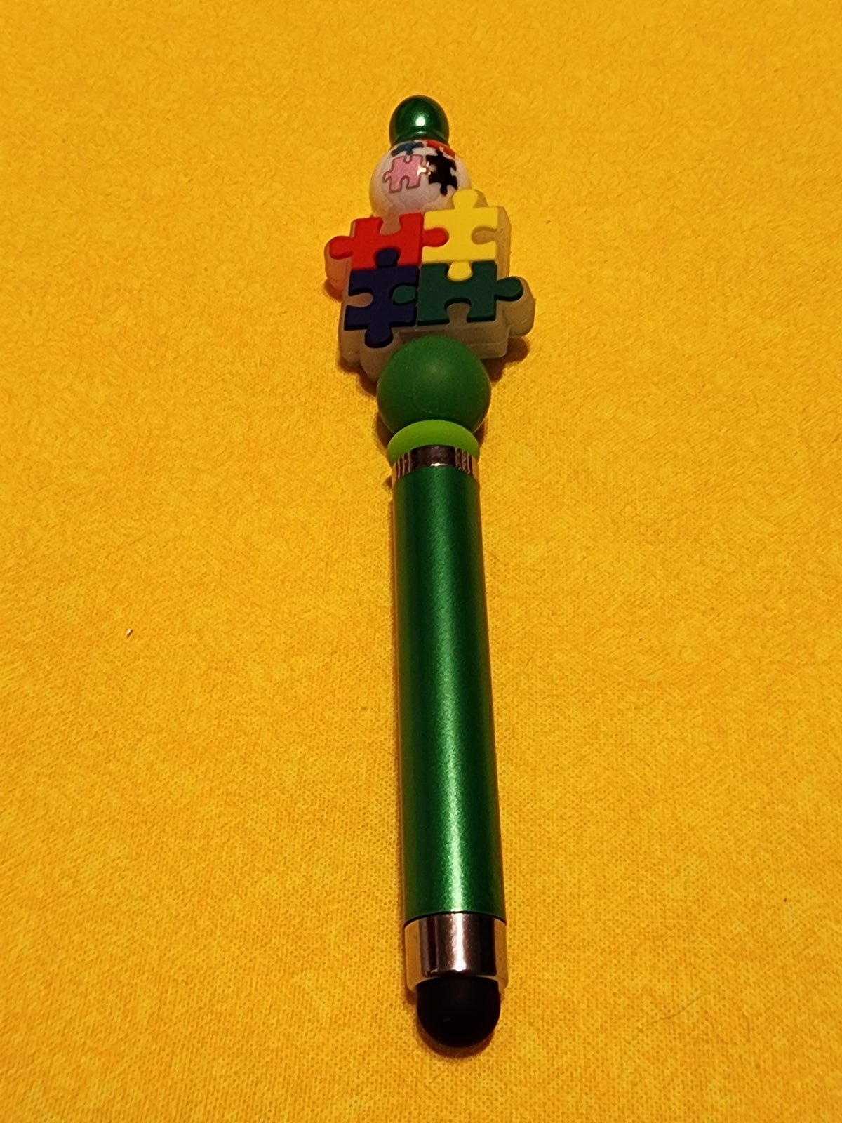 Green puzzle piece stylus