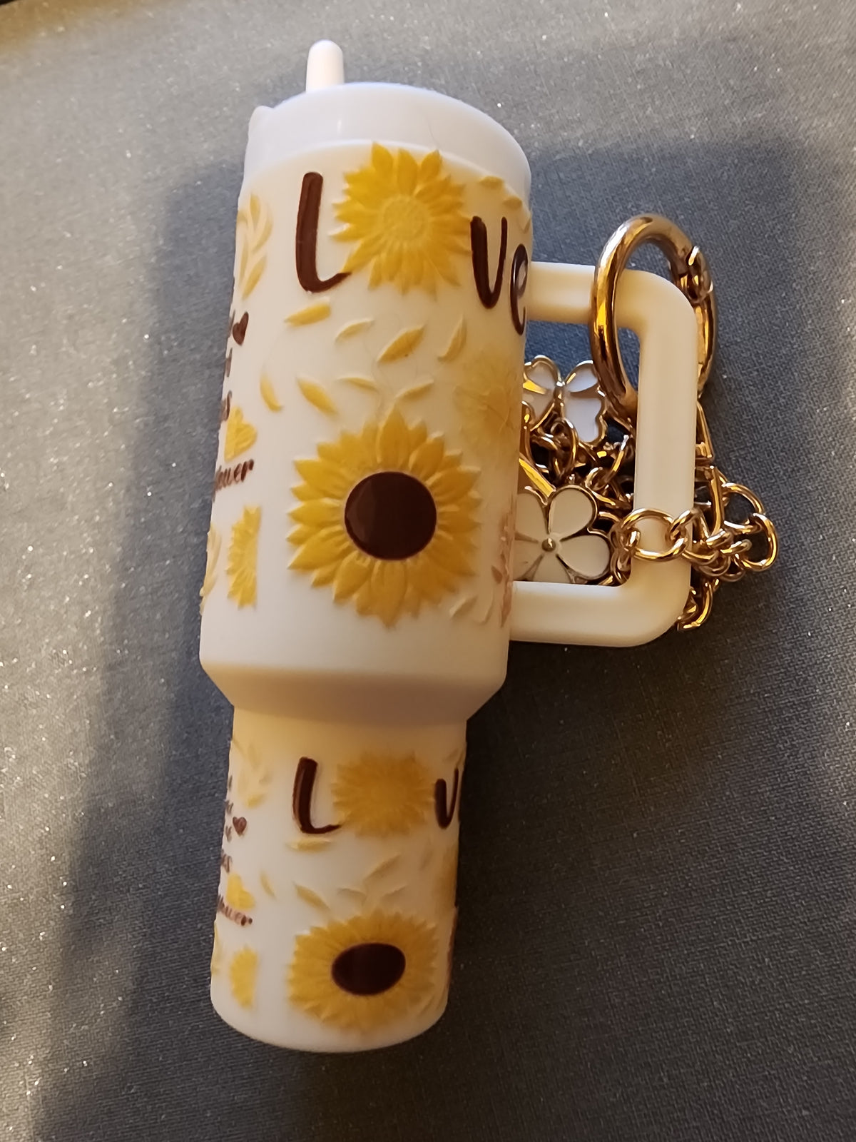 In a world of roses , be a sunflower 🌻  chapstick holder