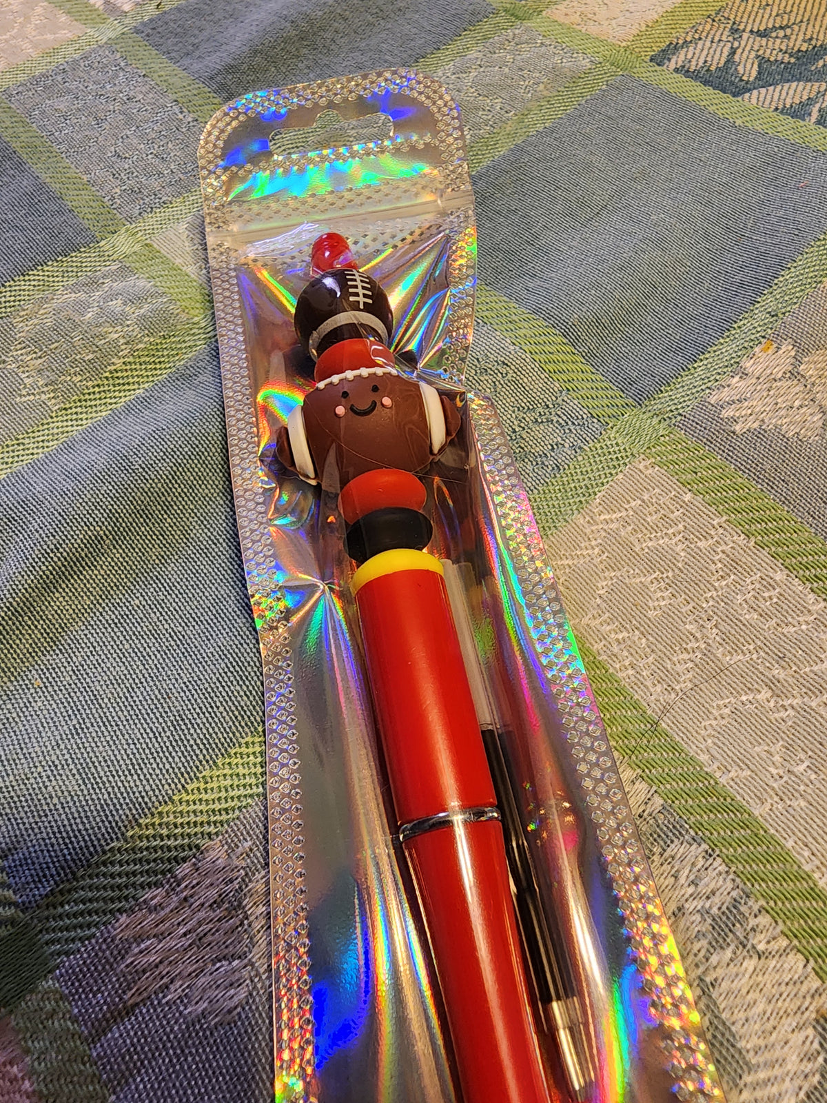 Red,  yellow and black football pen