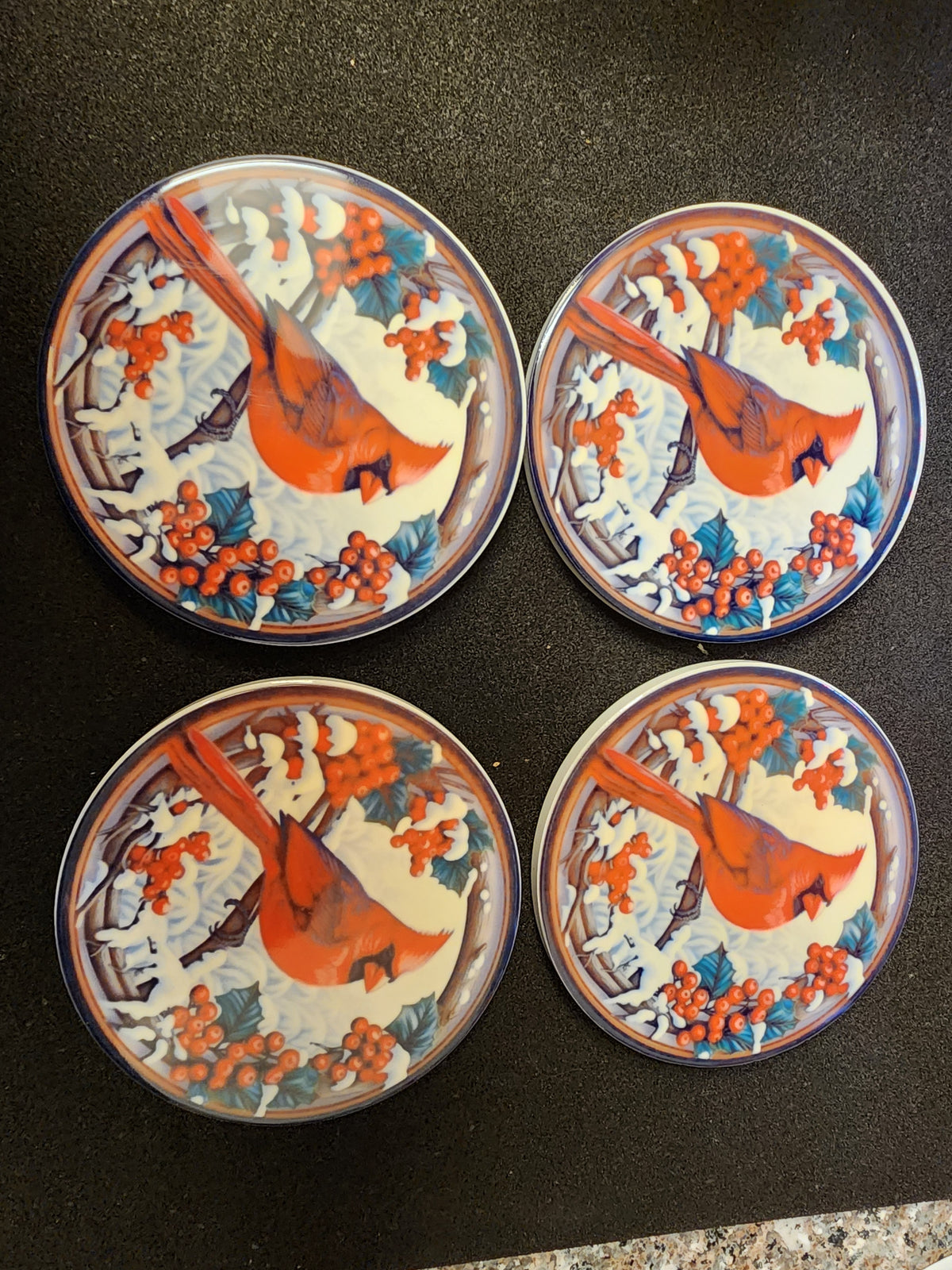 Snowy cardinal ceramic coaster