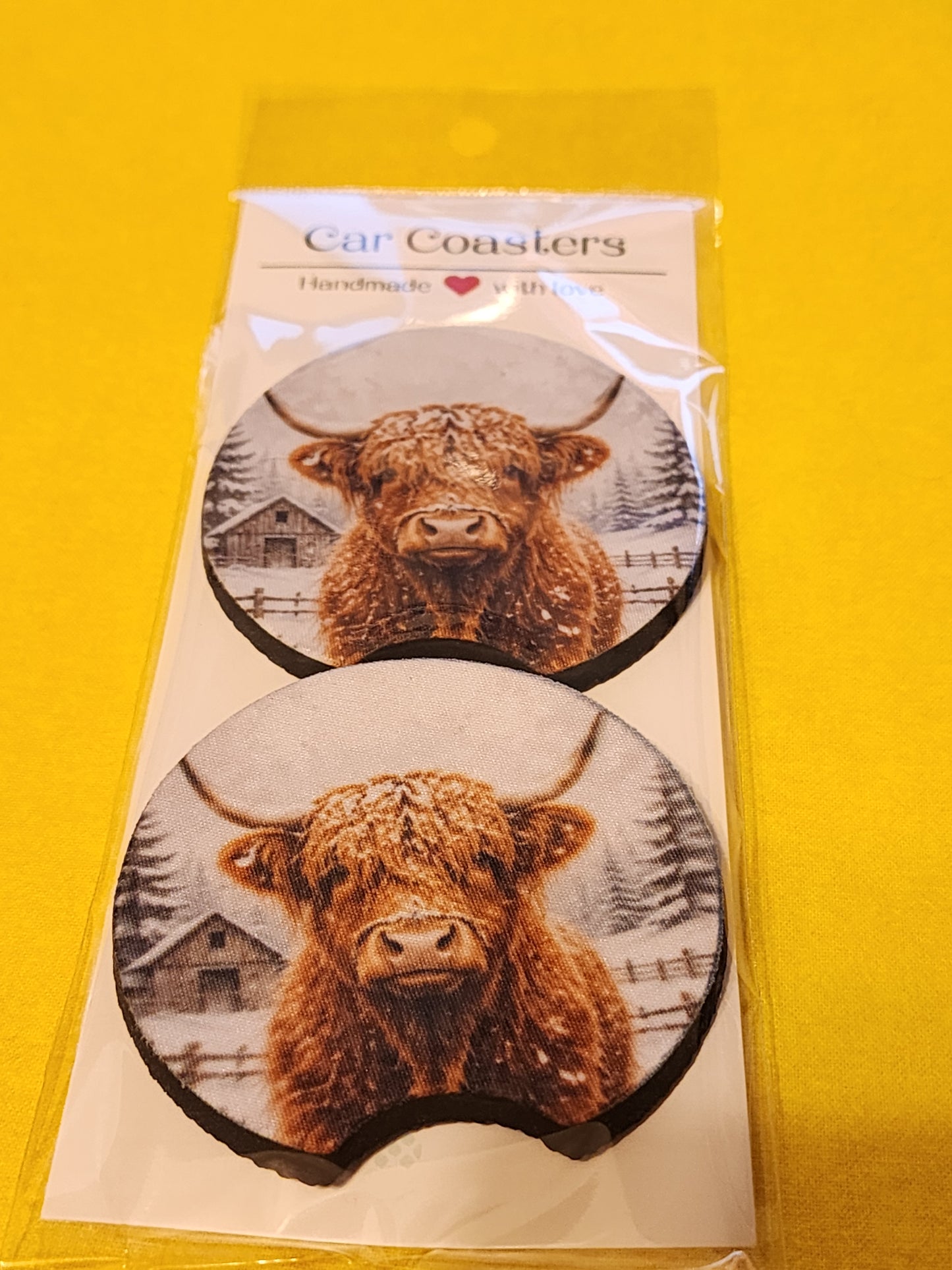 Snowy Highland cow car coasters