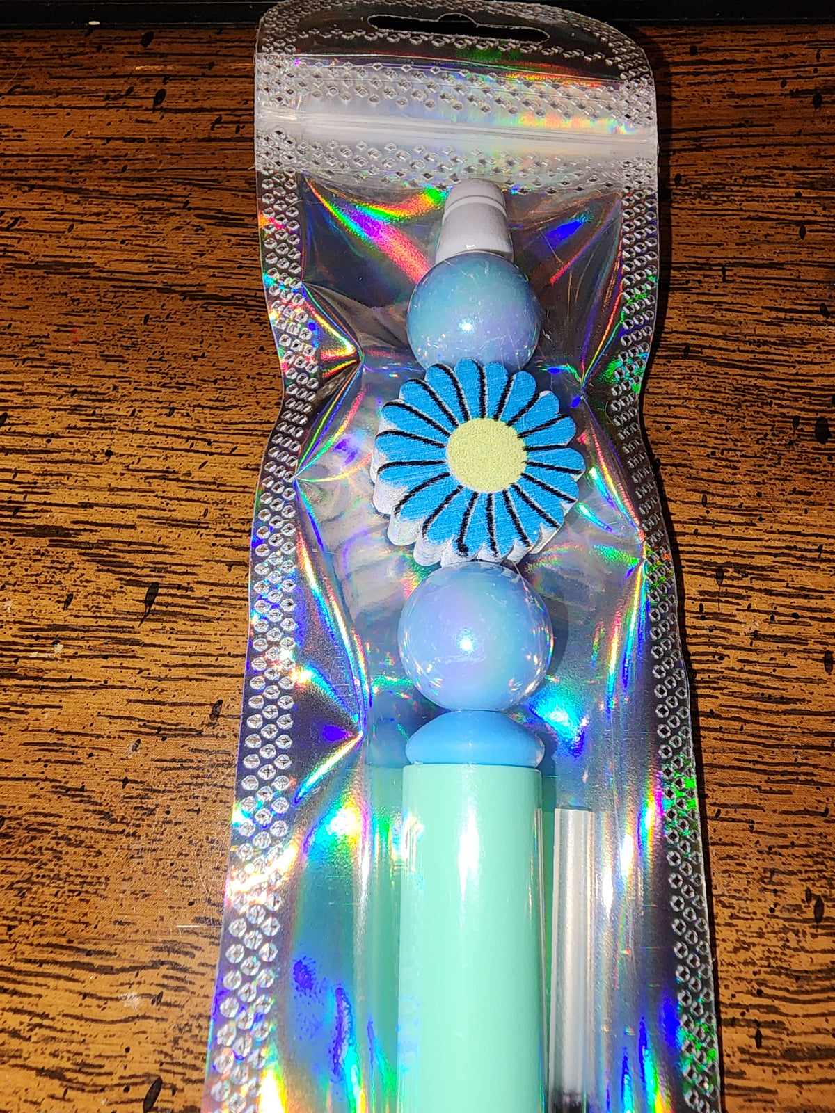 All blue daisy pen
