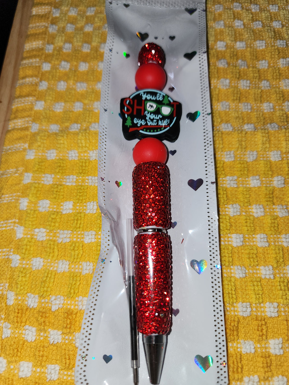 Red rhinestones you'll shoot your eye out pen