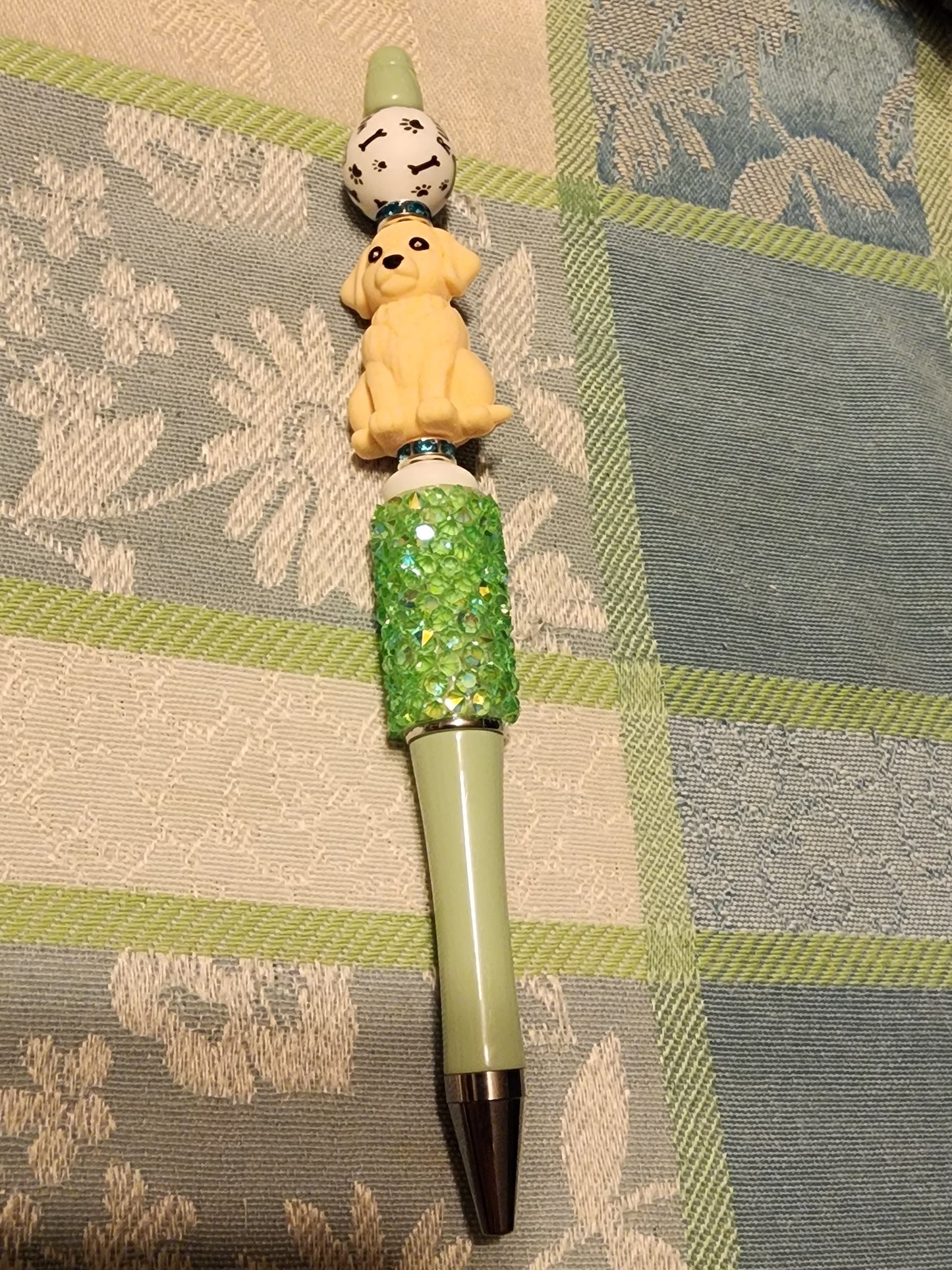 Golden retriever green pen