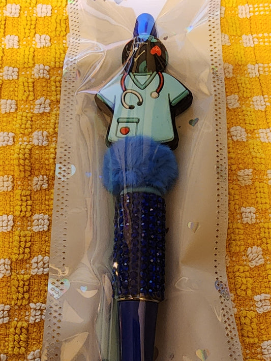 Dark blue scrub pen with fluffy bead