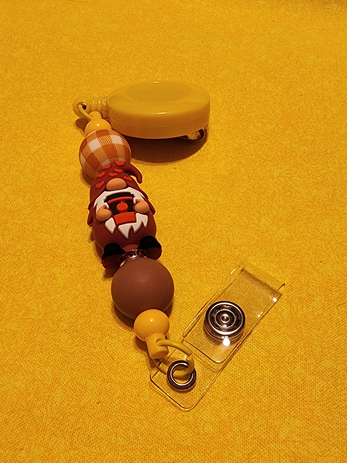 Gnome with cocoa badge reel