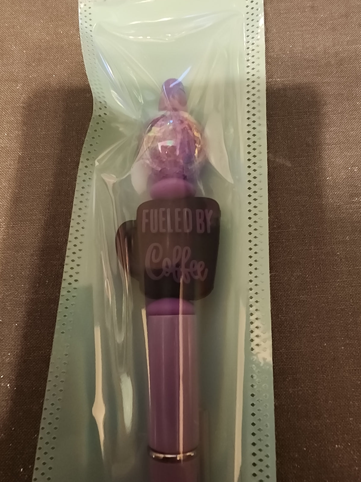 Fueled by coffee purple pen