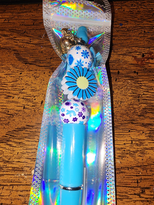 Blue and yellow daisy pen