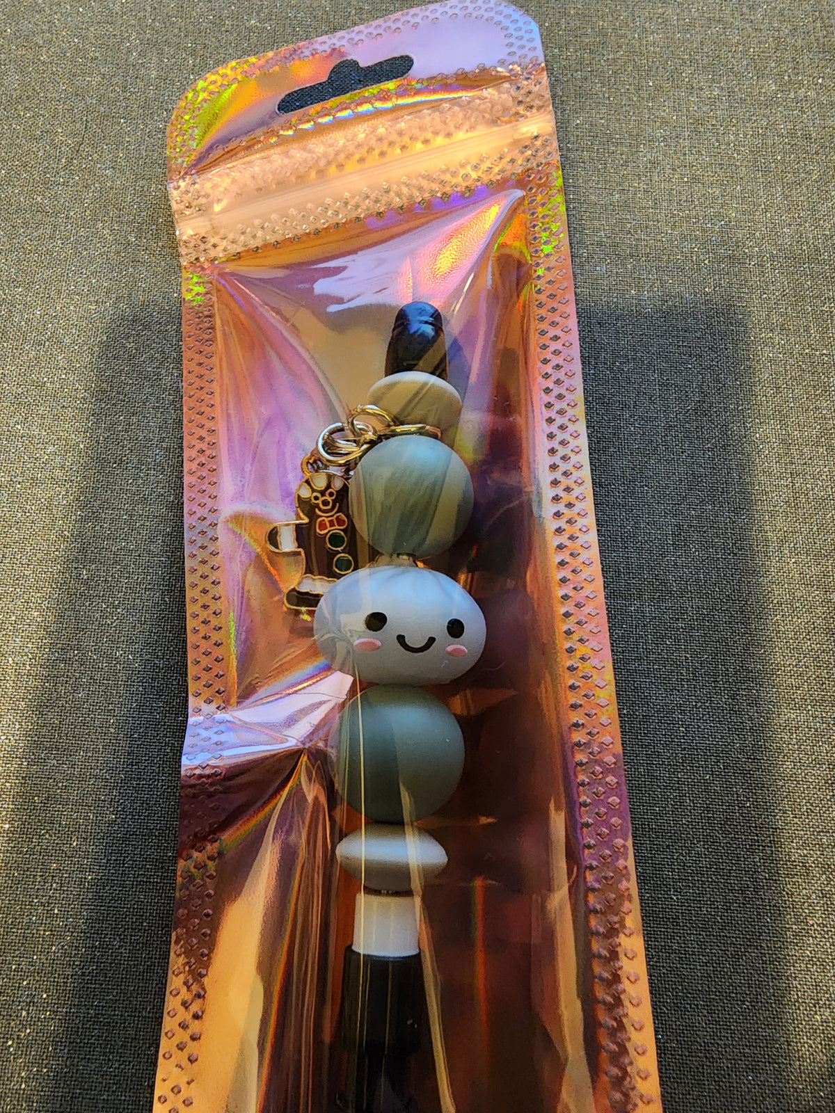 Opal dumpling with gingerbread charm mechanical pencil