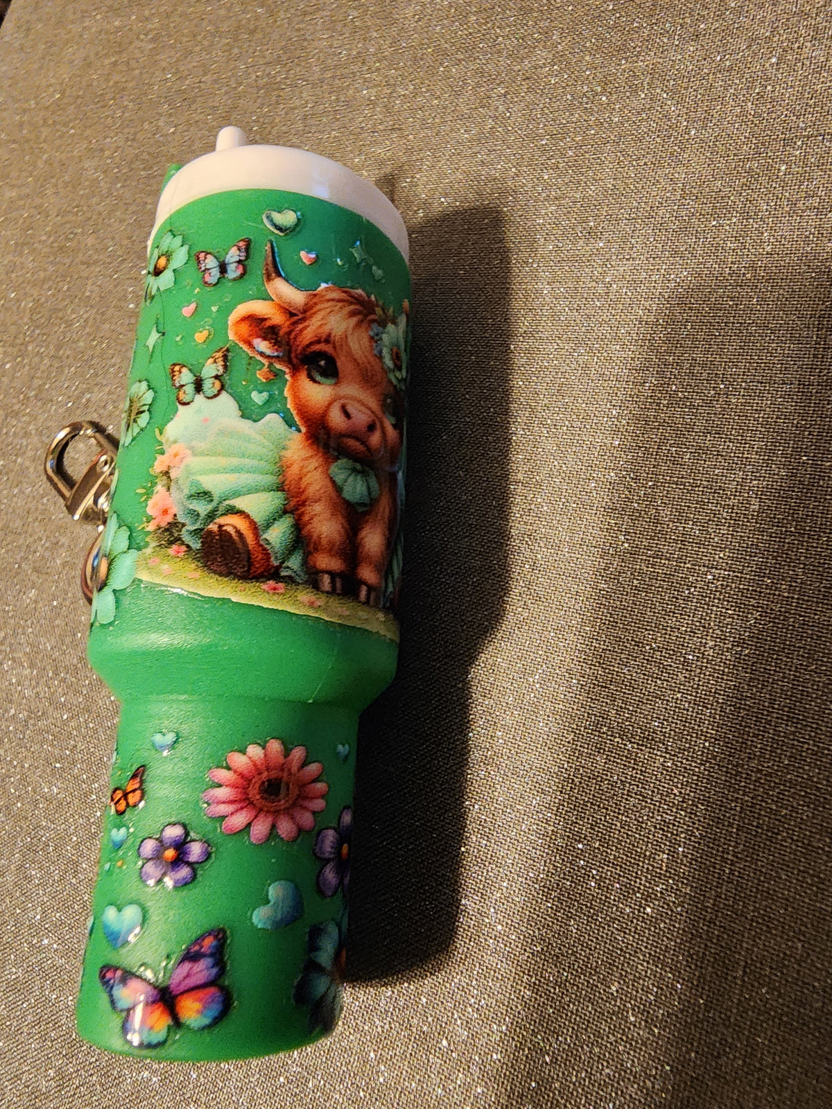Green highland cow in a tutu chapstick holder
