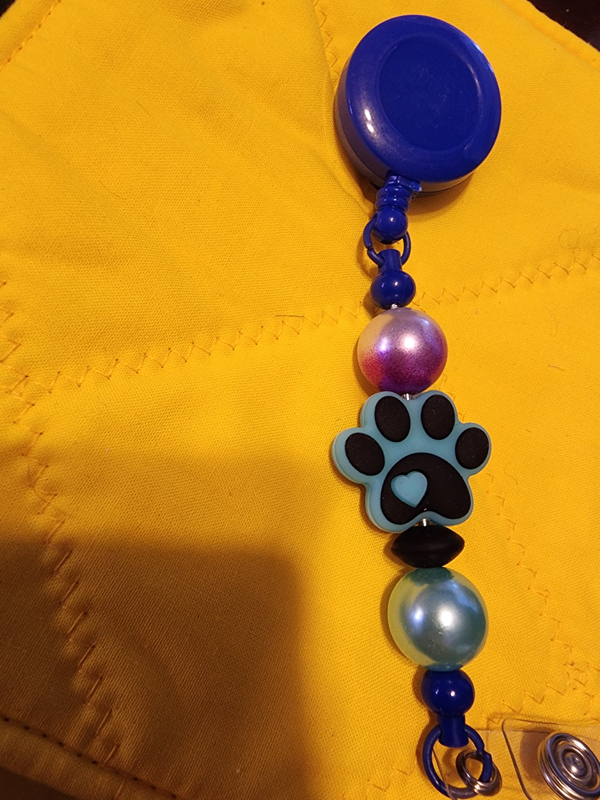 Blue reel with blue paw