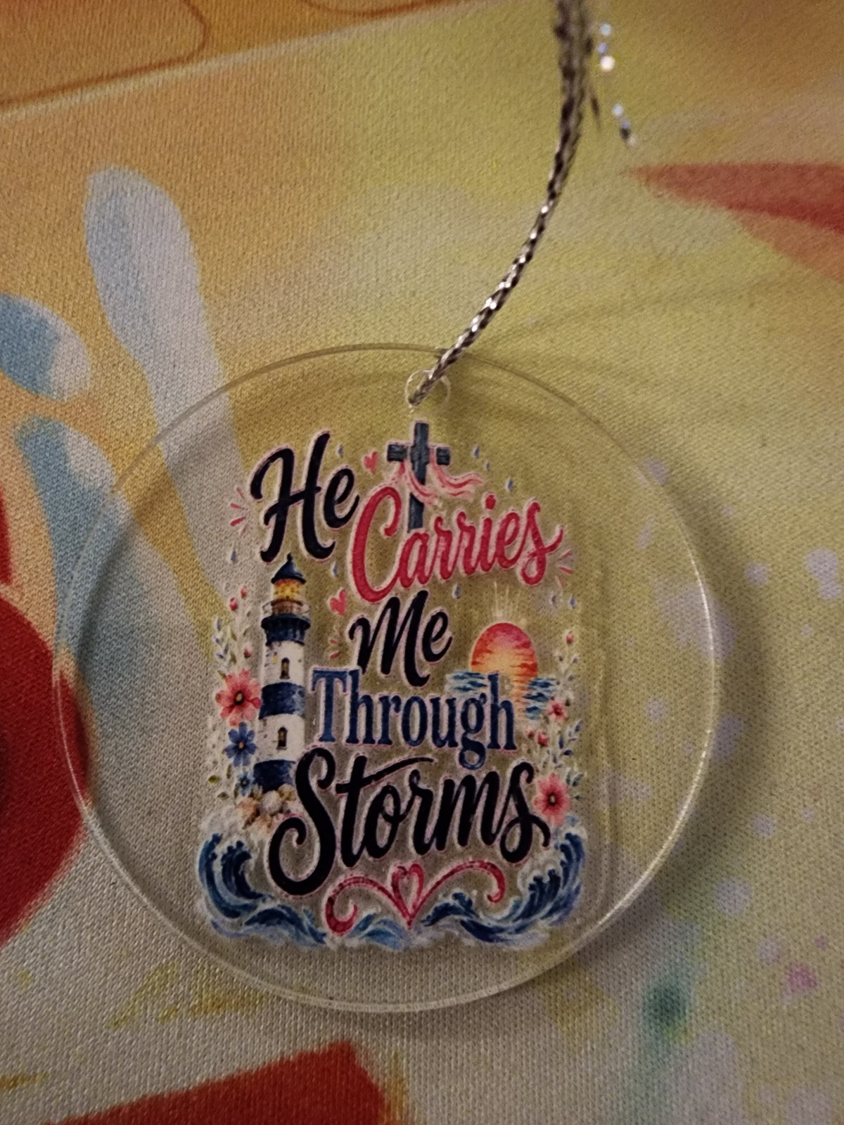 He carries me through the storm mini ornament