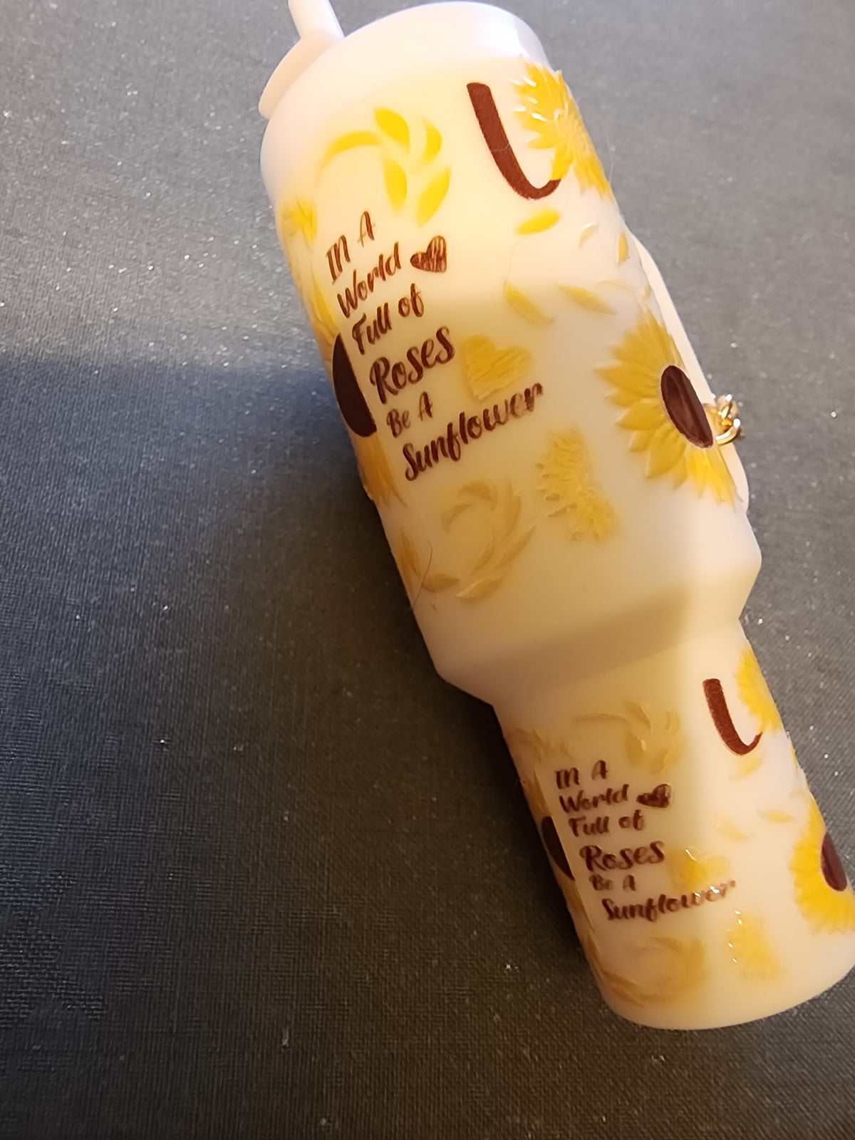 In a world of roses , be a sunflower 🌻  chapstick holder