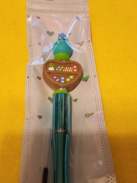 Shiny blue bookcase pen