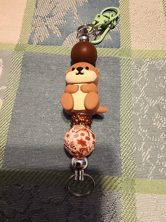 Otter keychain with floral