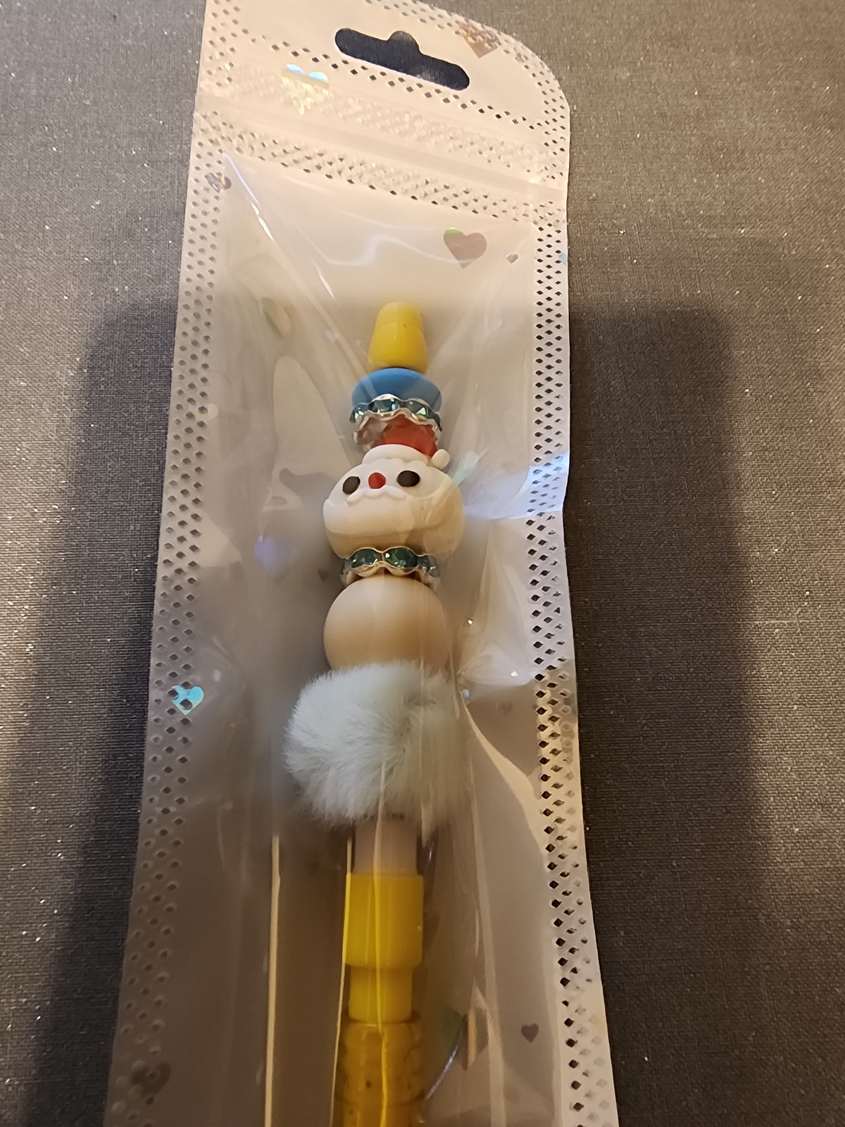 🎅 Santa dumpling on yellow mechanical pencil