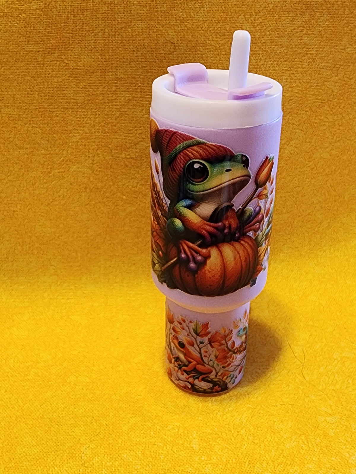Frog wearing a hat chapstick holder