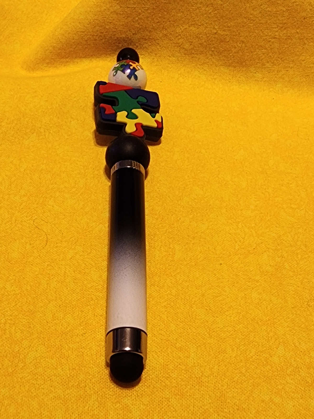 Autism puzzle piece stylus