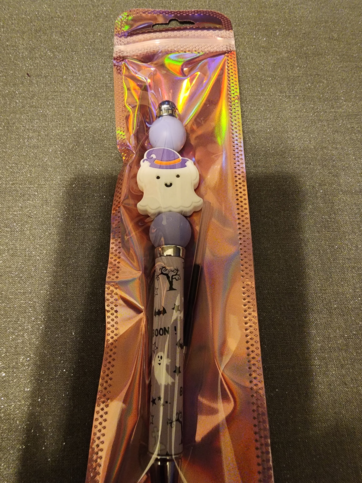 White ghost with purple hat pen