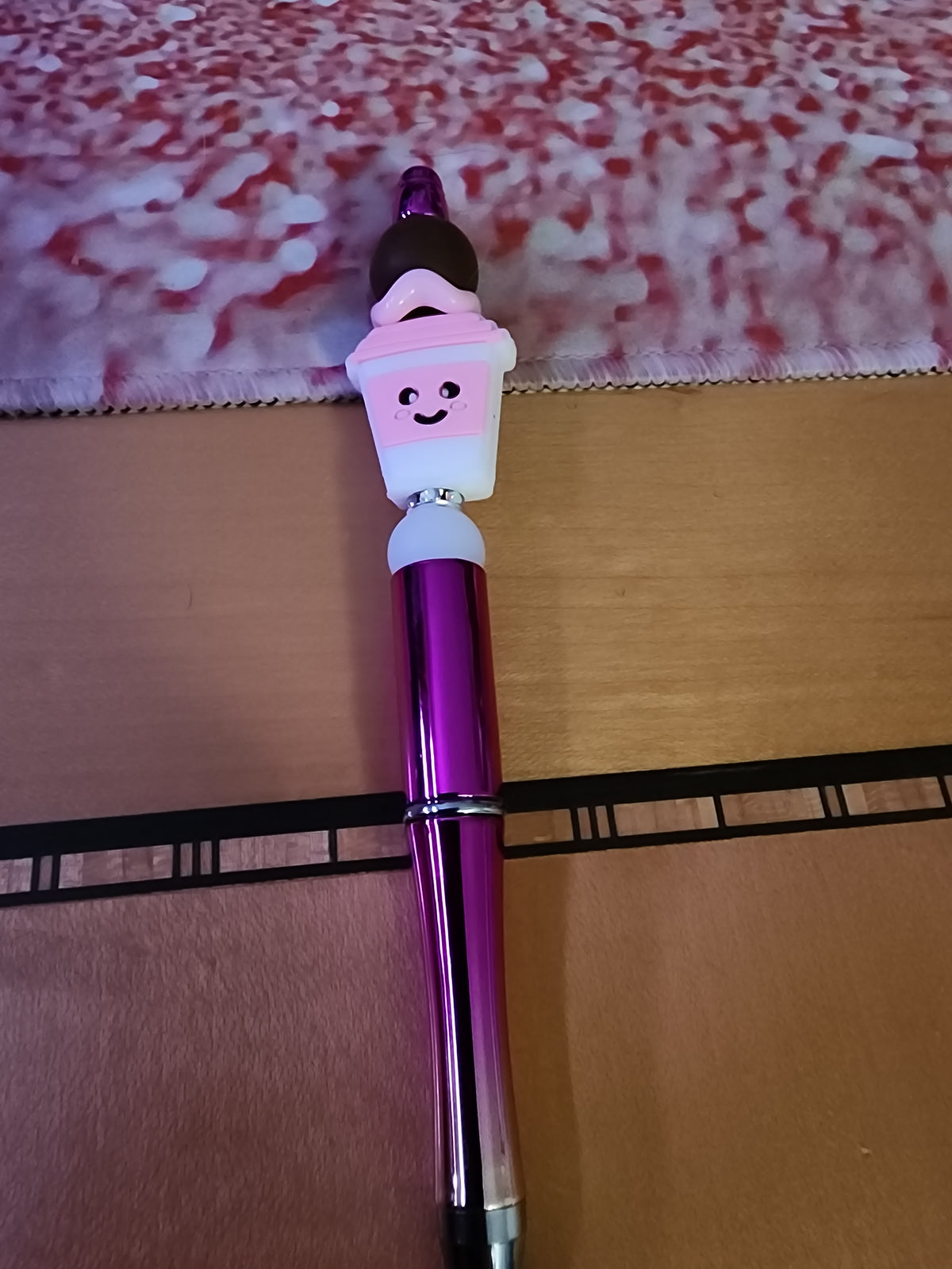 Pink coffee cups on a rose gold ombre pen